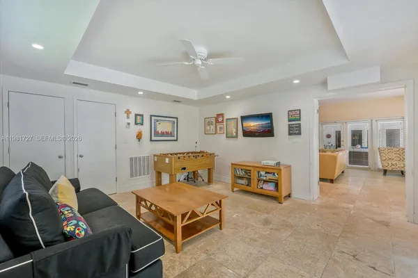 a living room with furniture and a window