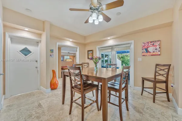 an aerial view of residential houses with outdoor space and street view