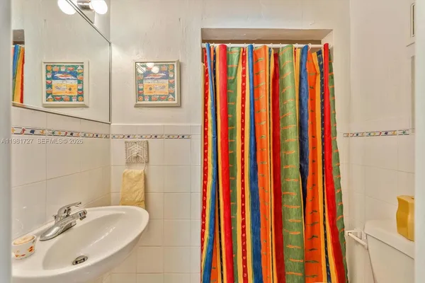 a living room with furniture window and a table