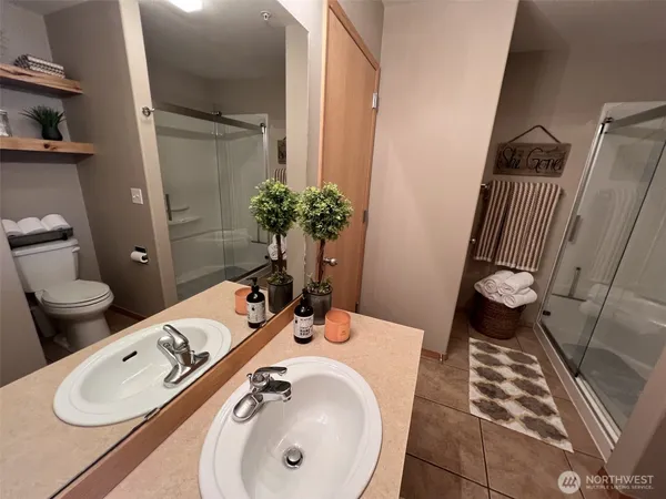 a bathroom with a sink and toilet