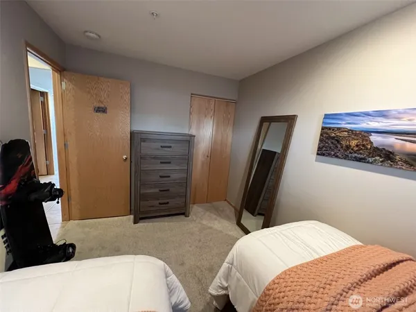 a bedroom with a bed and furniture