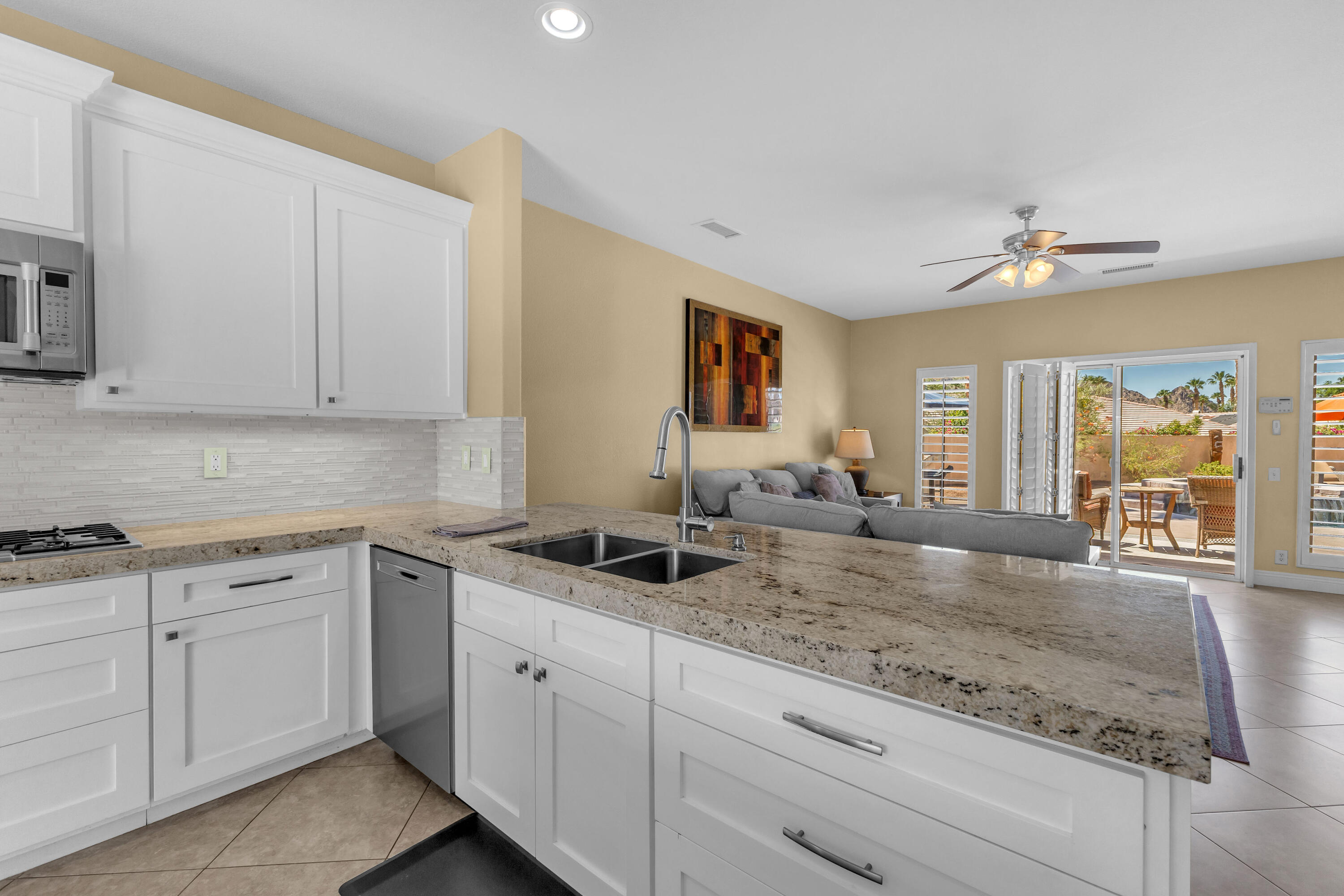47845 Vía Opera La Quinta, CA 92253 - Photo 11 of 47 a kitchen with sink and cabinets