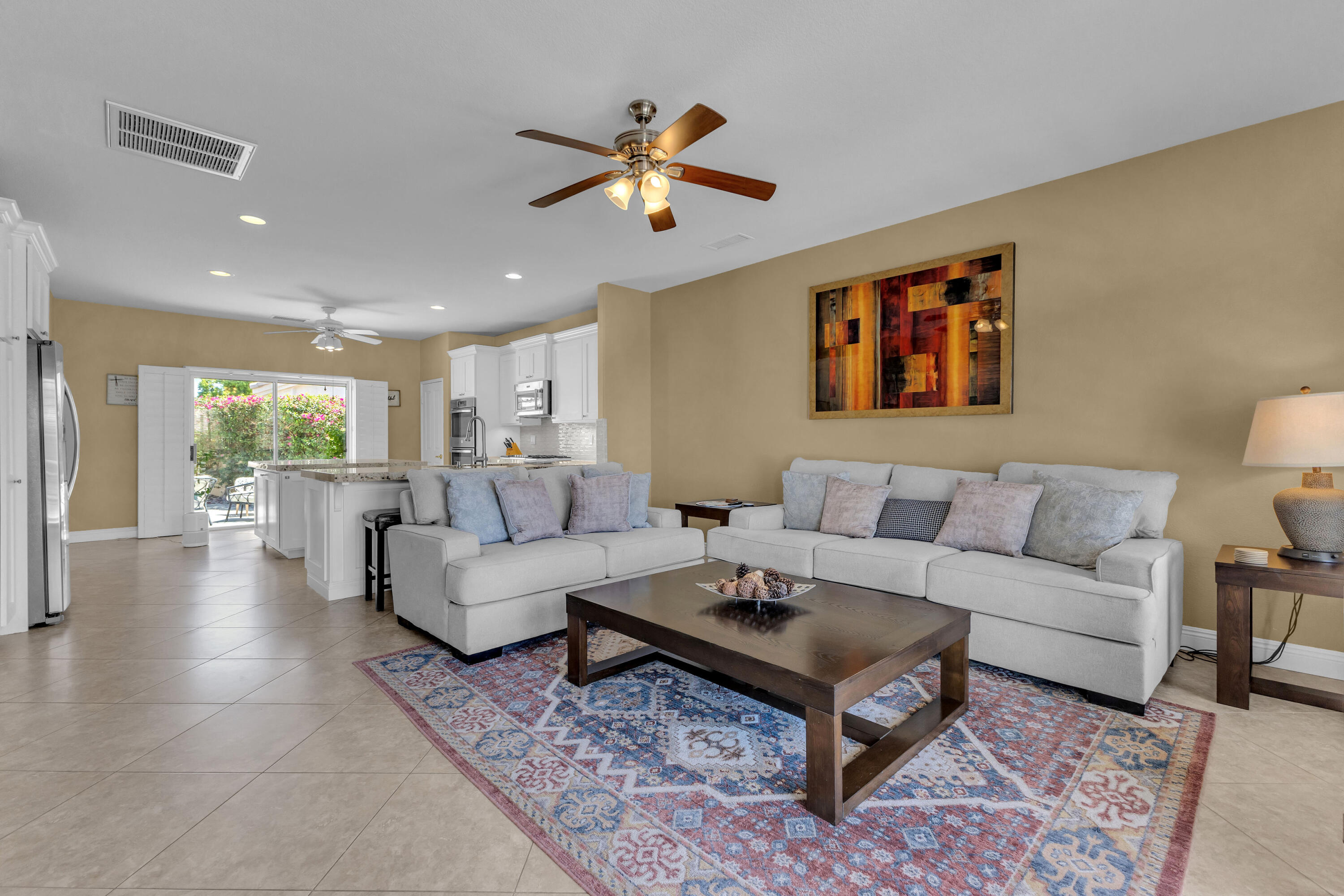 47845 Vía Opera La Quinta, CA 92253 - Photo 14 of 47 a living room with furniture ceiling fan and a rug