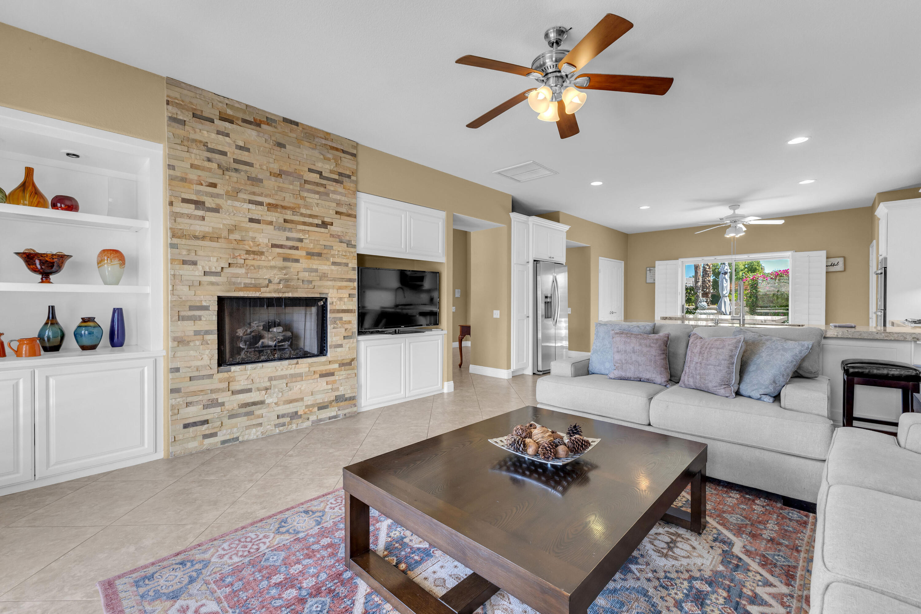 47845 Vía Opera La Quinta, CA 92253 - Photo 15 of 47 a living room with furniture and a fireplace