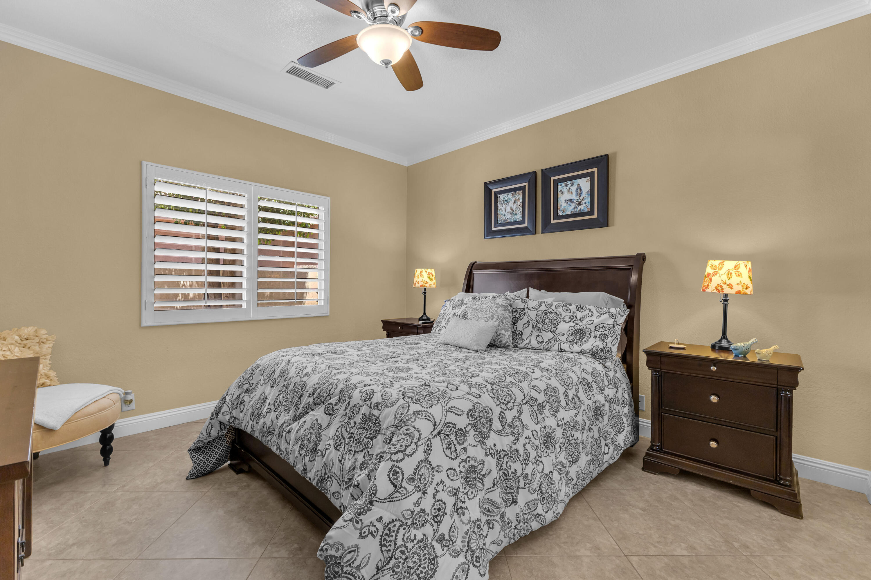 47845 Vía Opera La Quinta, CA 92253 - Photo 20 of 47 a bedroom with a bed and a chandelier