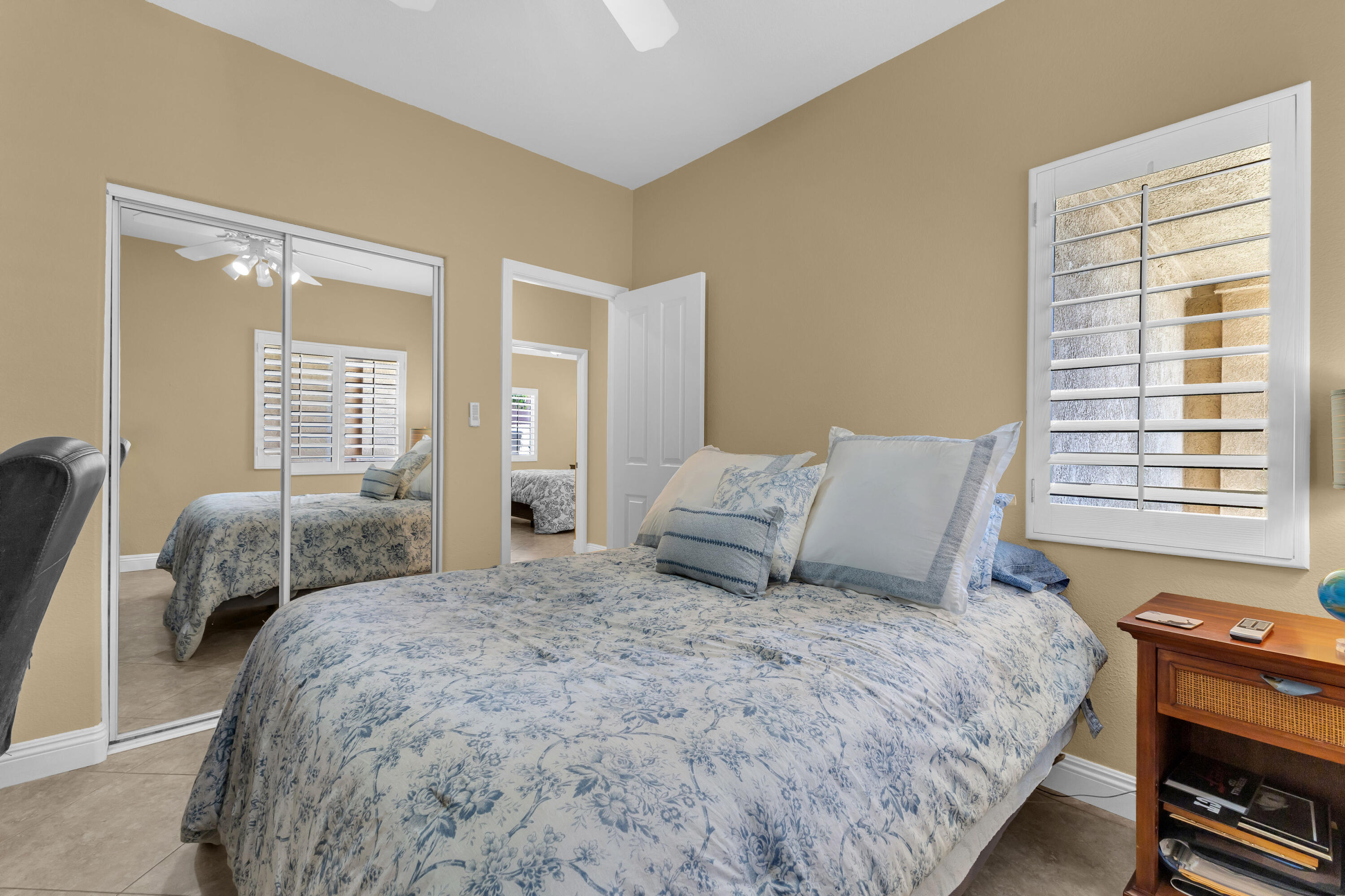 47845 Vía Opera La Quinta, CA 92253 - Photo 21 of 47 a bedroom with a bed and wooden floor