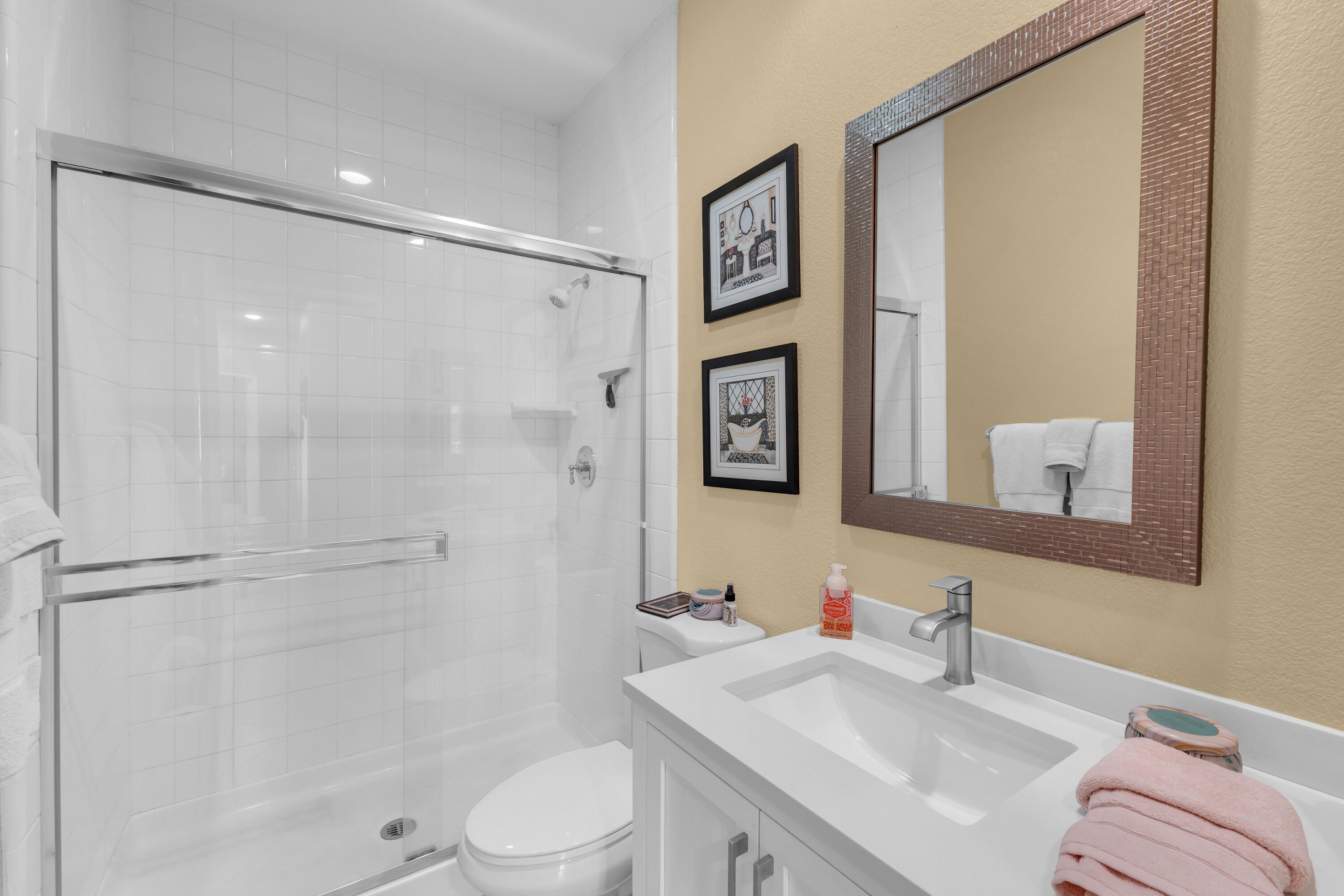 47845 Vía Opera La Quinta, CA 92253 - Photo 22 of 47 a bathroom with a sink and a mirror