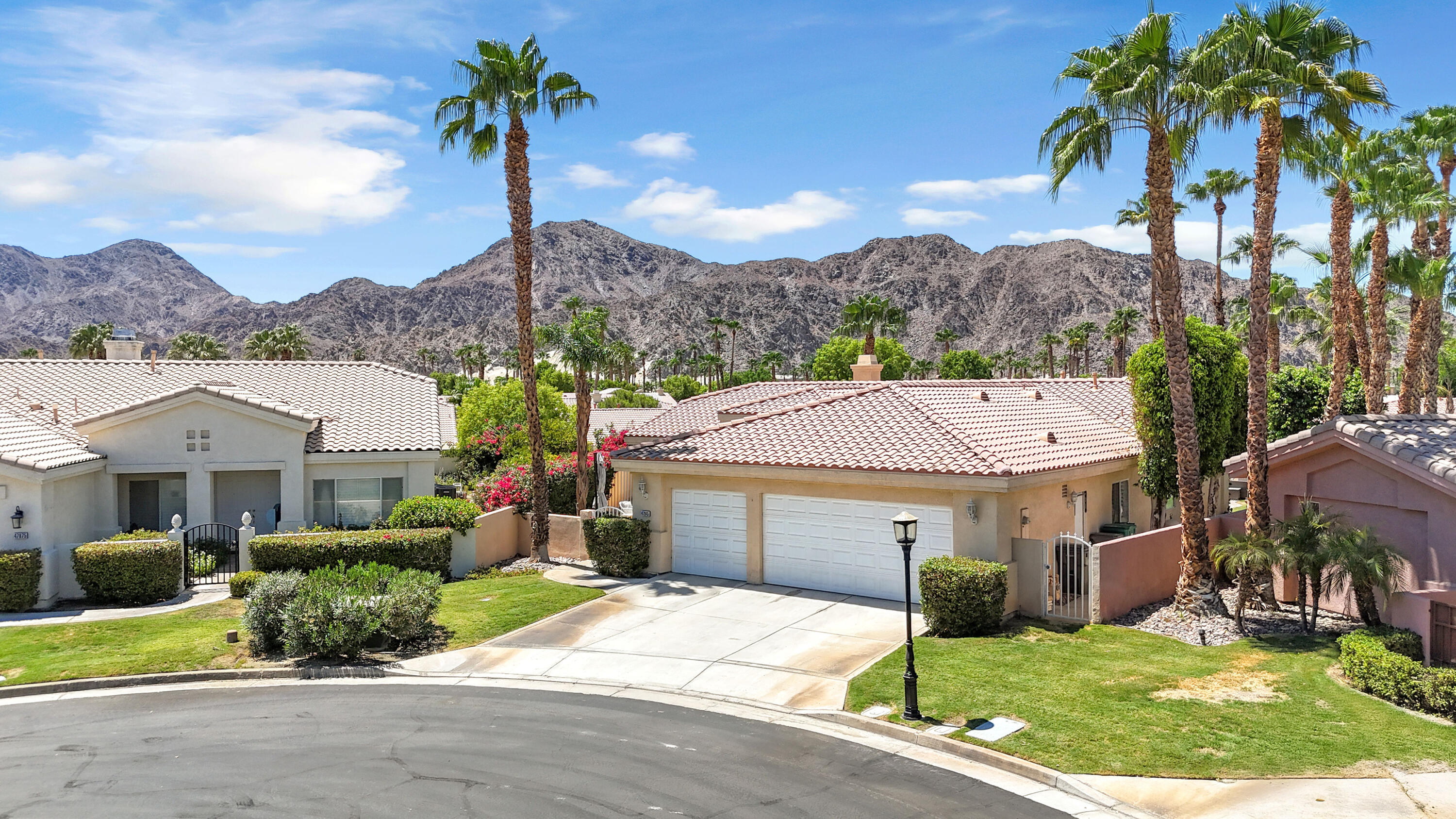 47845 Vía Opera La Quinta, CA 92253 - Photo 23 of 47 a aerial view of a house with a yard and potted plants