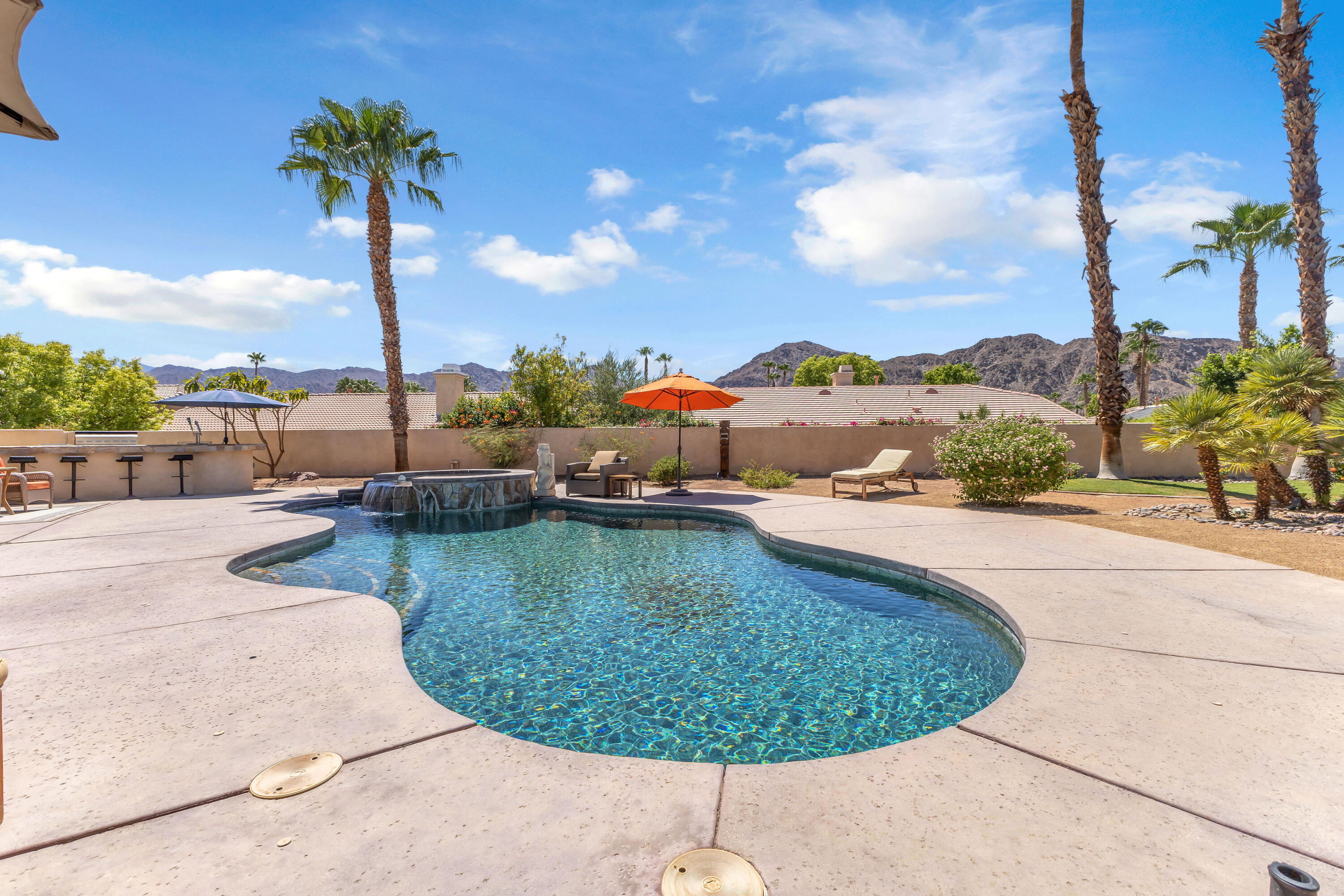 47845 Vía Opera La Quinta, CA 92253 - Photo 30 of 47 a view of a swimming pool with a terrace