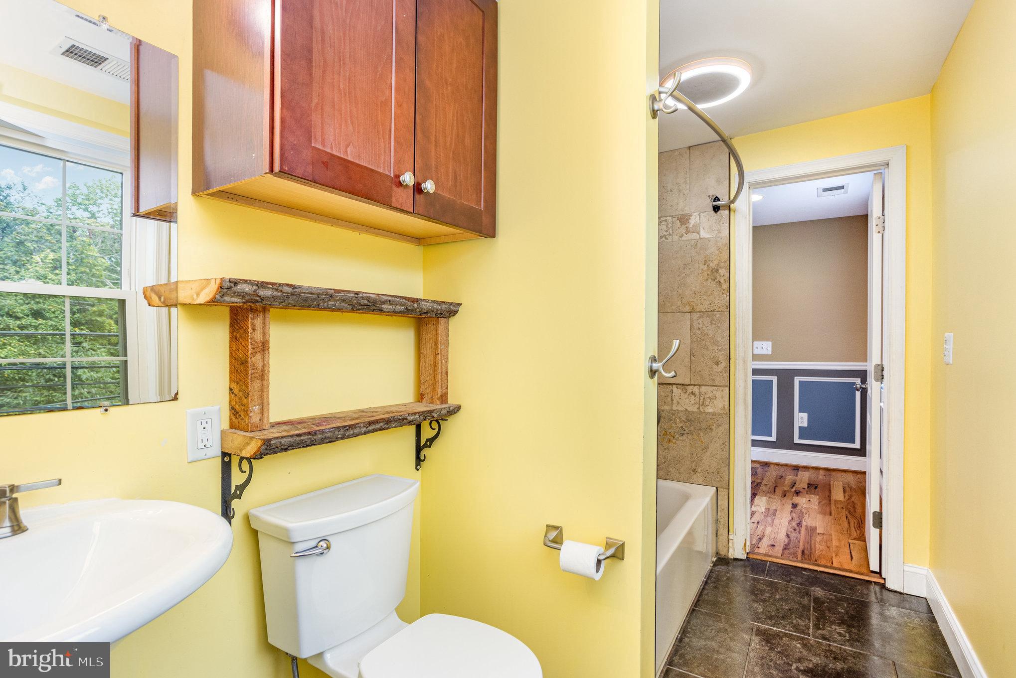 4033 Conowingo Road Darlington, MD 21034 - Photo 20 of 42 a bathroom with a sink toilet and shower