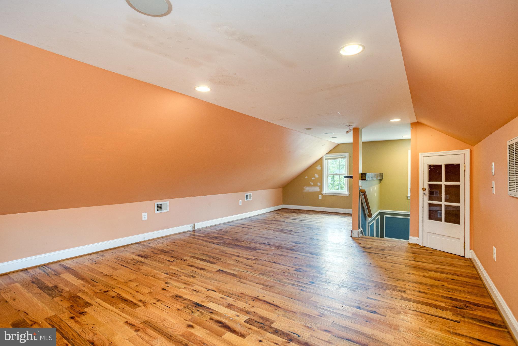 4033 Conowingo Road Darlington, MD 21034 - Photo 31 of 42 an empty room with wooden floor and windows