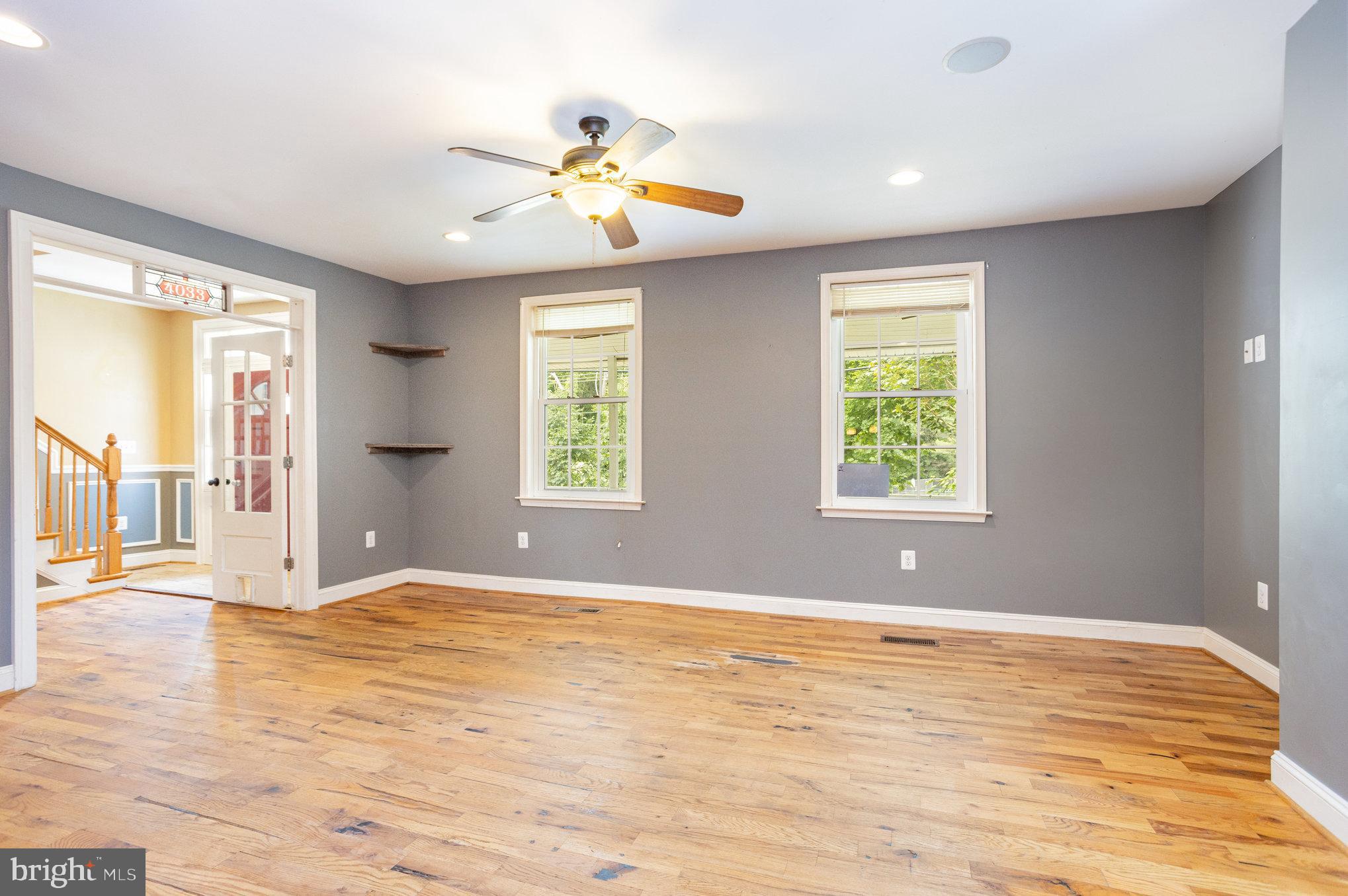 4033 Conowingo Road Darlington, MD 21034 - Photo 5 of 42 a view of an empty room with window and wooden floor