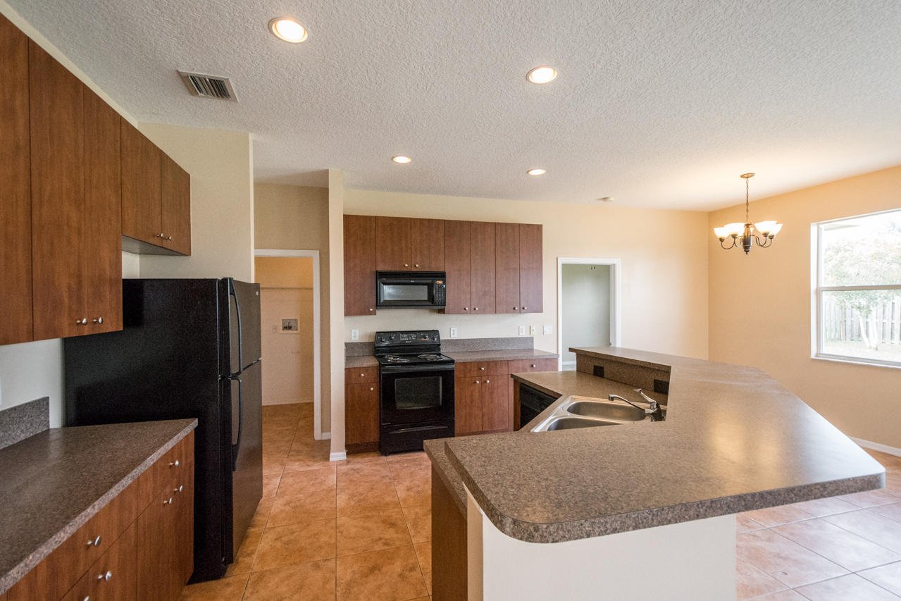 4202 Southwest Whitebread Road Port St. Lucie, FL 34953 - Photo 7 of 20 DSC_2789