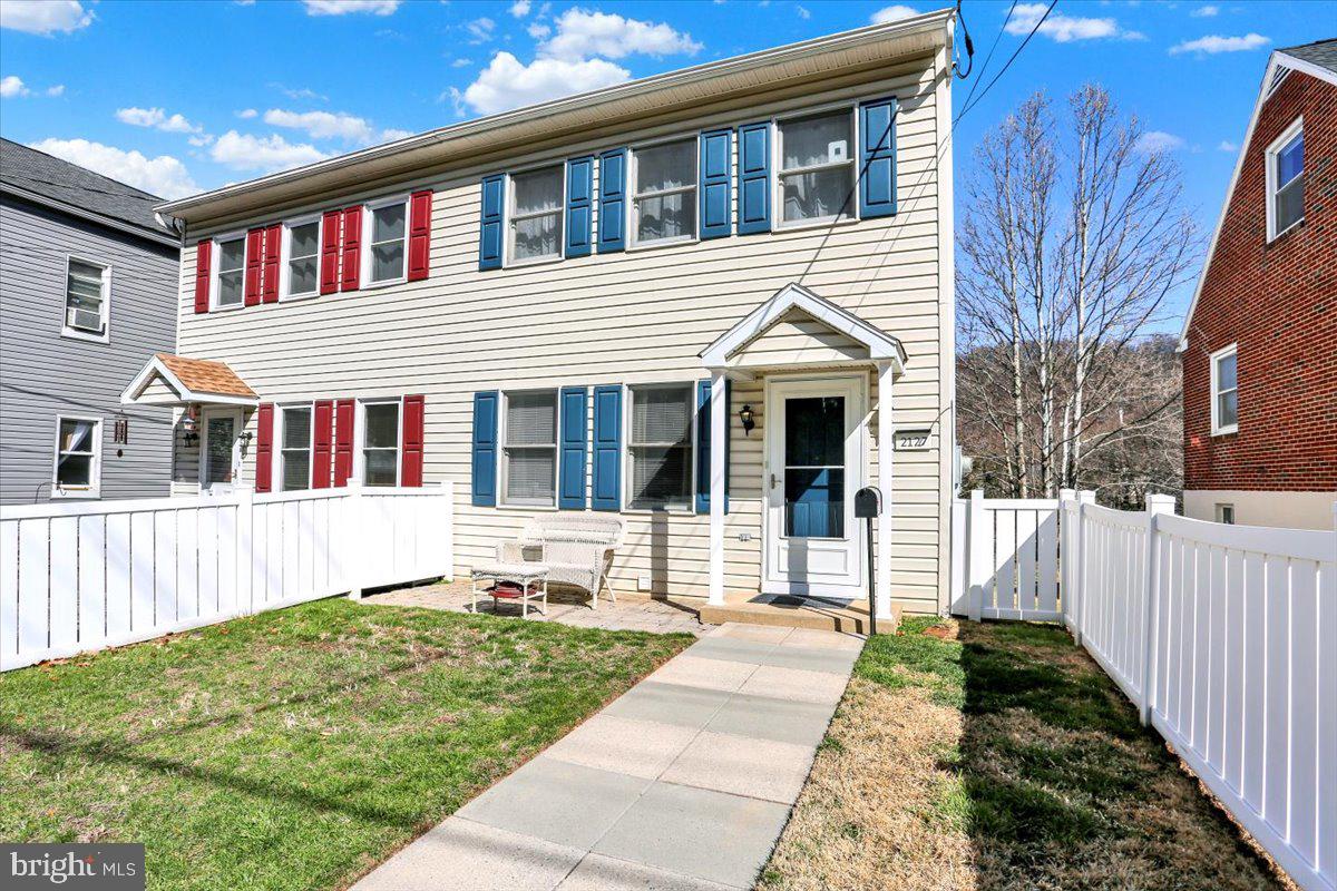 2127 Fairview Avenue Reading, PA 19606 - Photo 1 of 28 a front view of a house with a yard