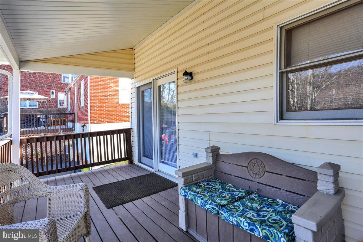2127 Fairview Avenue Reading, PA 19606 - Photo 13 of 28 a view of a wooden deck with a bench