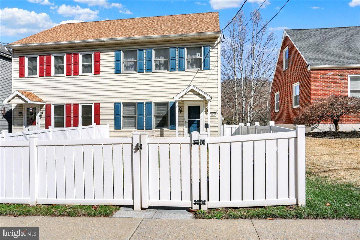 2127 Fairview Avenue Reading, PA 19606 - Photo 2 of 28 a front view of a house with a garden
