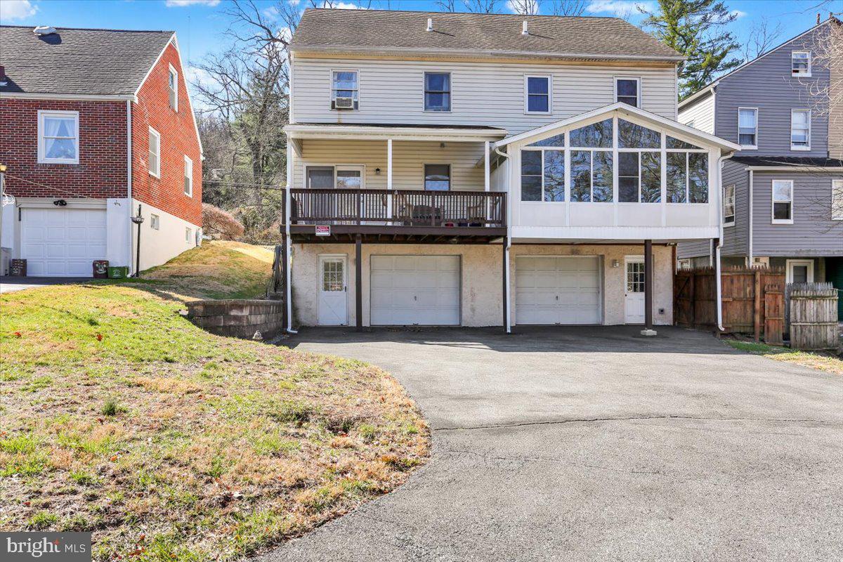 2127 Fairview Avenue Reading, PA 19606 - Photo 26 of 28 a front view of a house with a yard