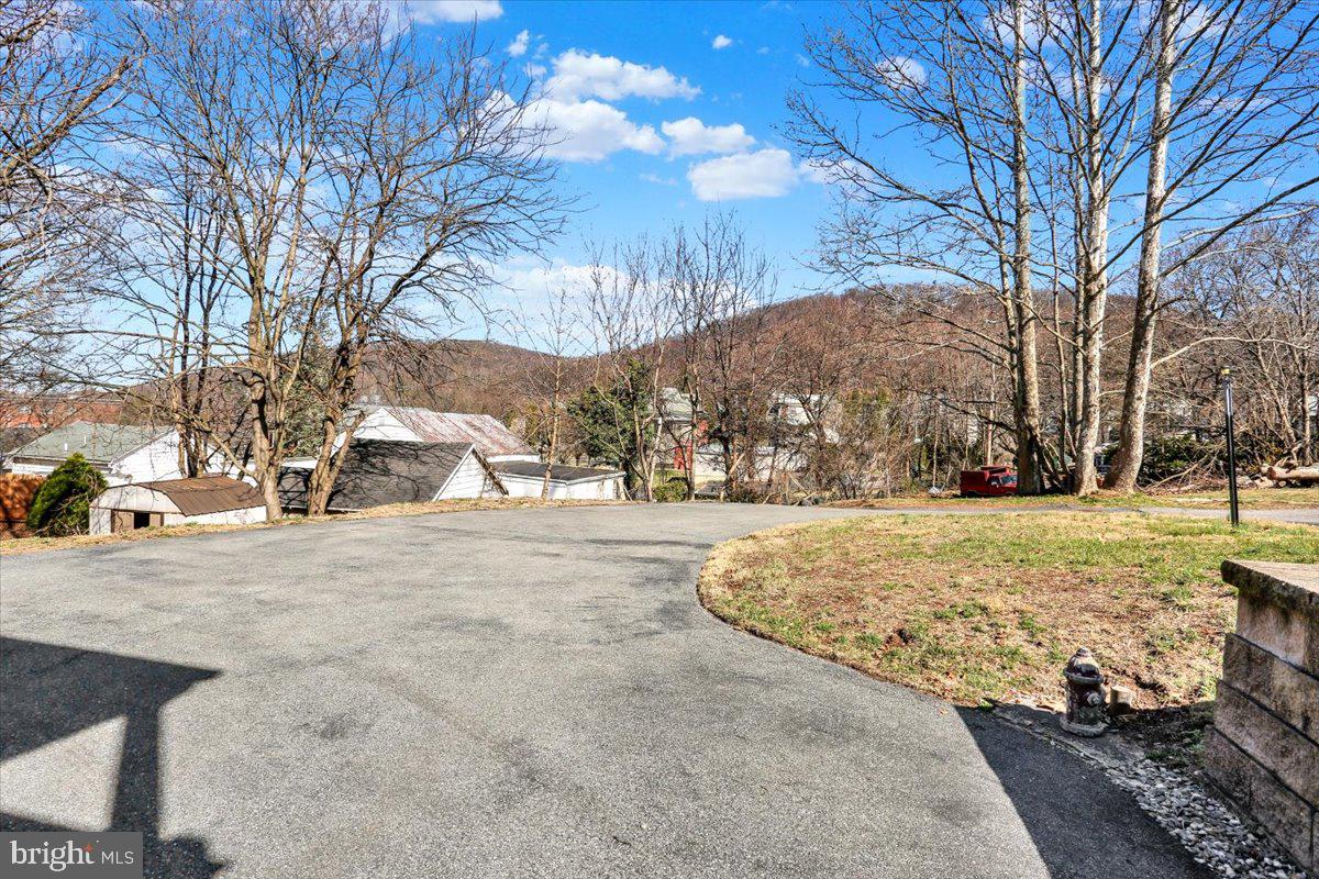2127 Fairview Avenue Reading, PA 19606 - Photo 28 of 28 a view of a yard covered with snow in front of house