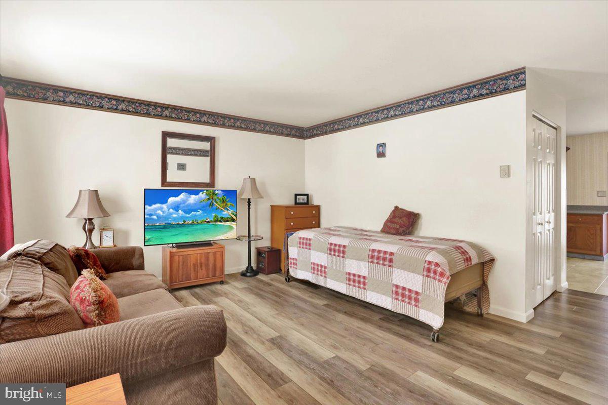 2127 Fairview Avenue Reading, PA 19606 - Photo 4 of 28 a bedroom with a bed and a flat screen tv