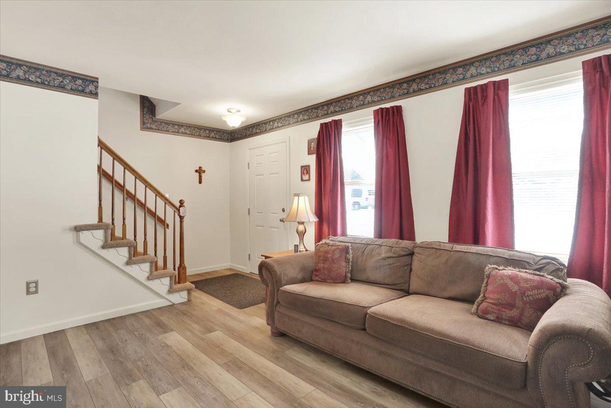 2127 Fairview Avenue Reading, PA 19606 - Photo 6 of 28 a living room with furniture and a window