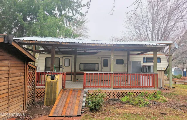 a front view of a house with a porch