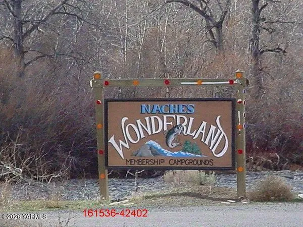 a sign on the side of a park