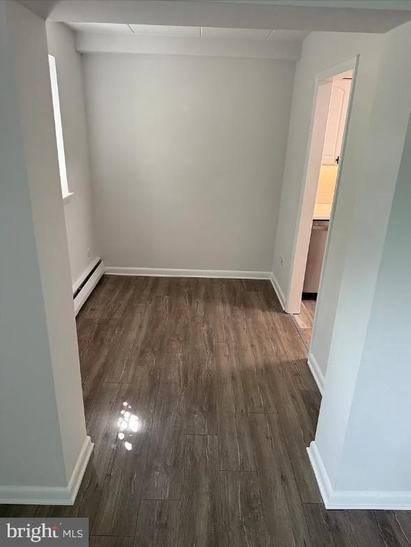 37 East Montgomery Avenue, Unit 2 Ardmore, PA 19003 - Photo 9 of 11 an empty room with wooden floor and windows