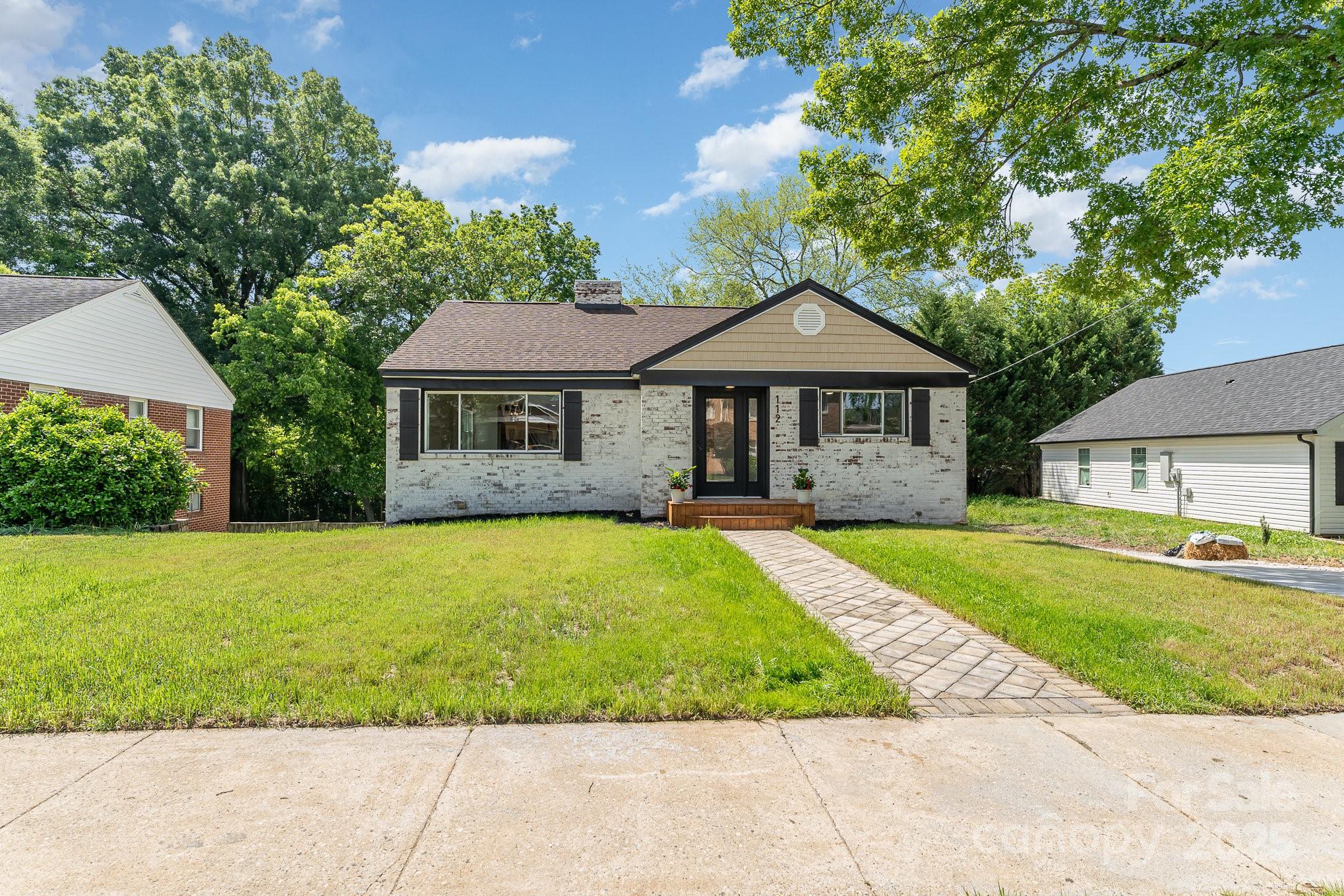 112 Circle Drive Salisbury, NC 28144 - Photo 13 of 34 a front view of a house with a garden