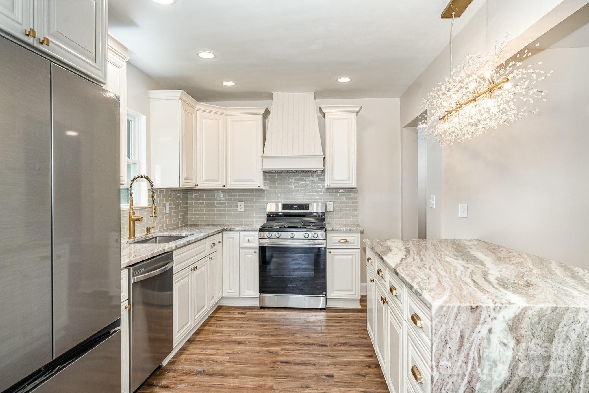 112 Circle Drive Salisbury, NC 28144 - Photo 16 of 34 a kitchen with a stove top oven sink and cabinets