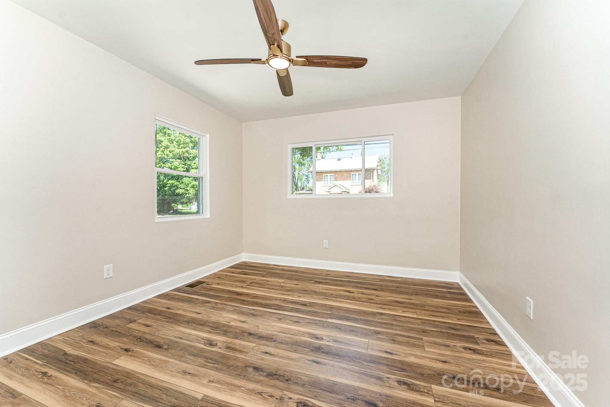 112 Circle Drive Salisbury, NC 28144 - Photo 24 of 34 wooden floor in an empty room with a window