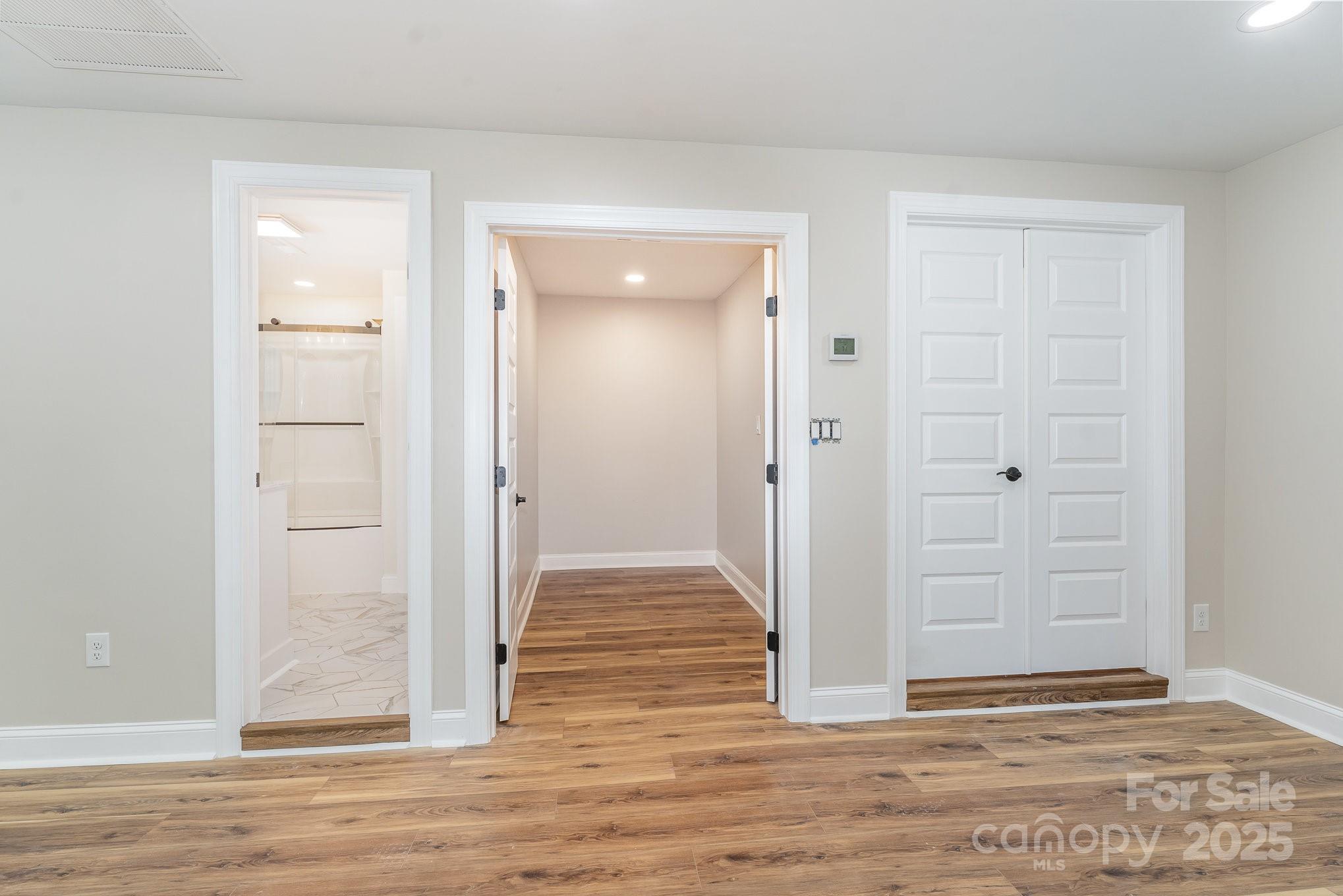 112 Circle Drive Salisbury, NC 28144 - Photo 29 of 34 an empty room with wooden floor and closet