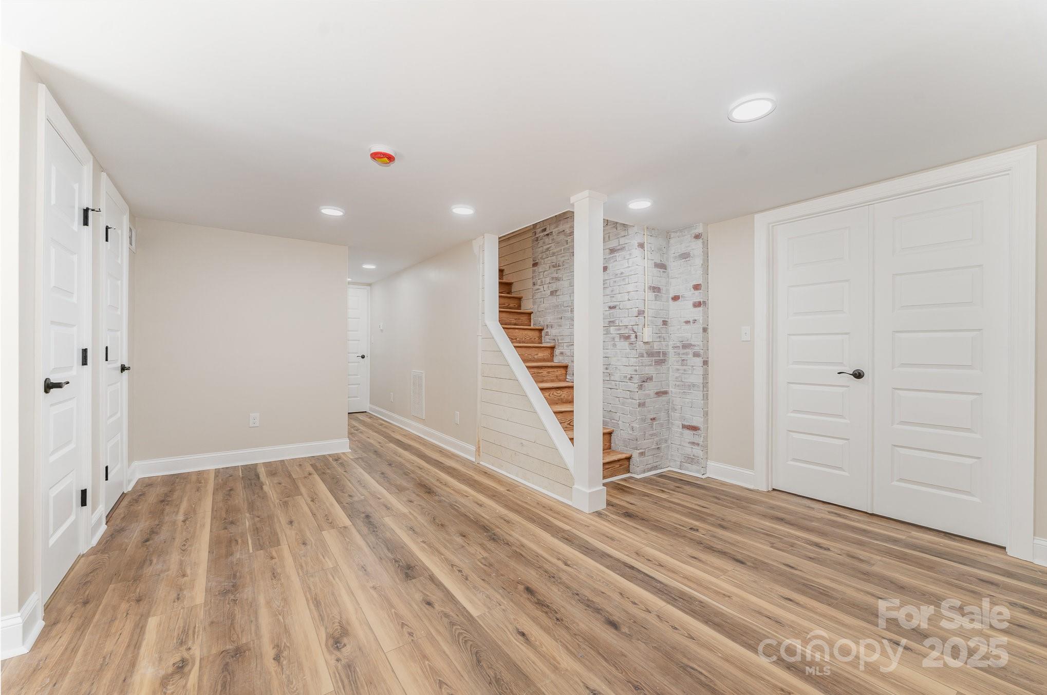 112 Circle Drive Salisbury, NC 28144 - Photo 30 of 34 wooden floor in an empty room with a window