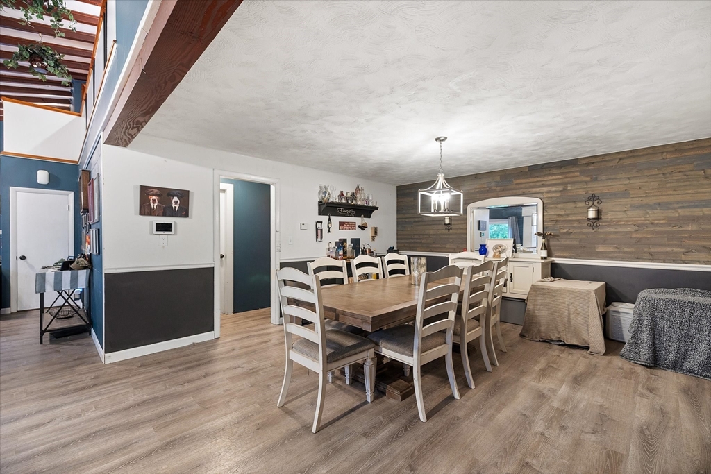 709 North Orange Road Athol, MA 01331 - Photo 11 of 40 a view of a dining room with furniture window and wooden floor