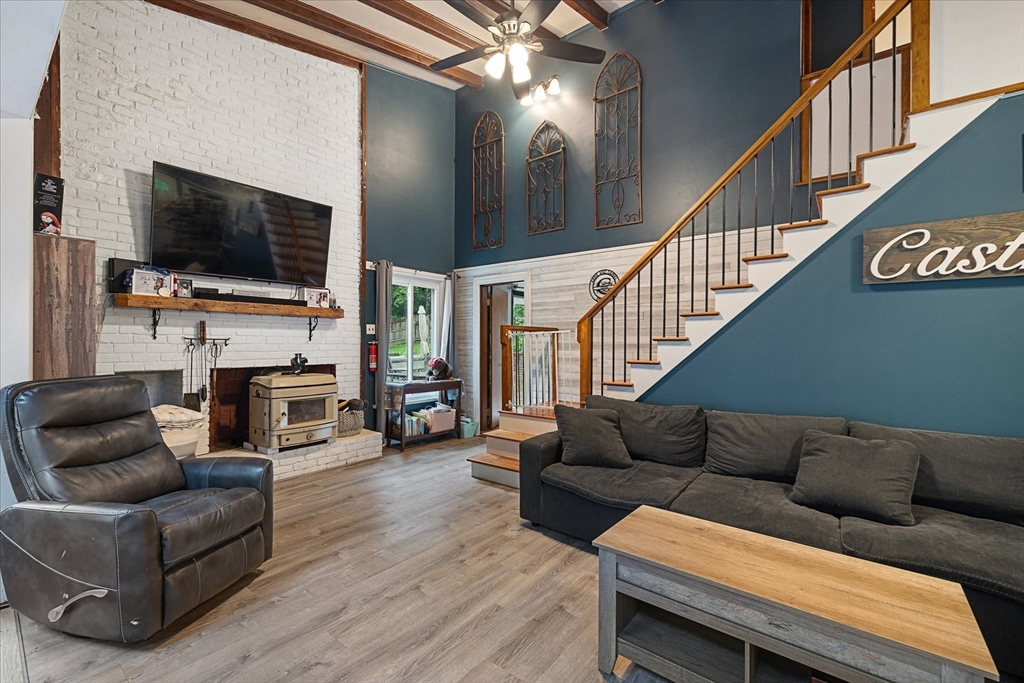 709 North Orange Road Athol, MA 01331 - Photo 15 of 40 a living room with furniture and a flat screen tv