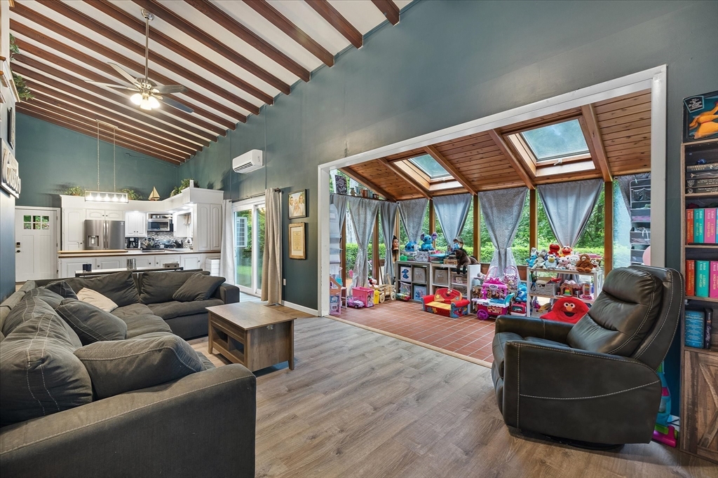709 North Orange Road Athol, MA 01331 - Photo 16 of 40 a living room with furniture and a large window