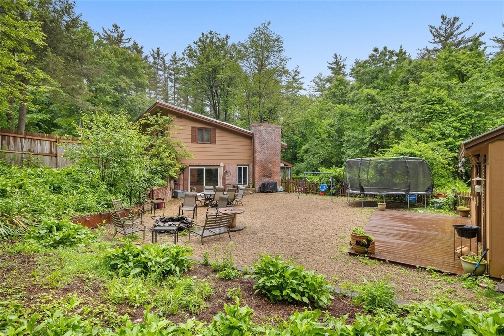 709 North Orange Road Athol, MA 01331 - Photo 34 of 40 a view of a backyard with sitting area and furniture