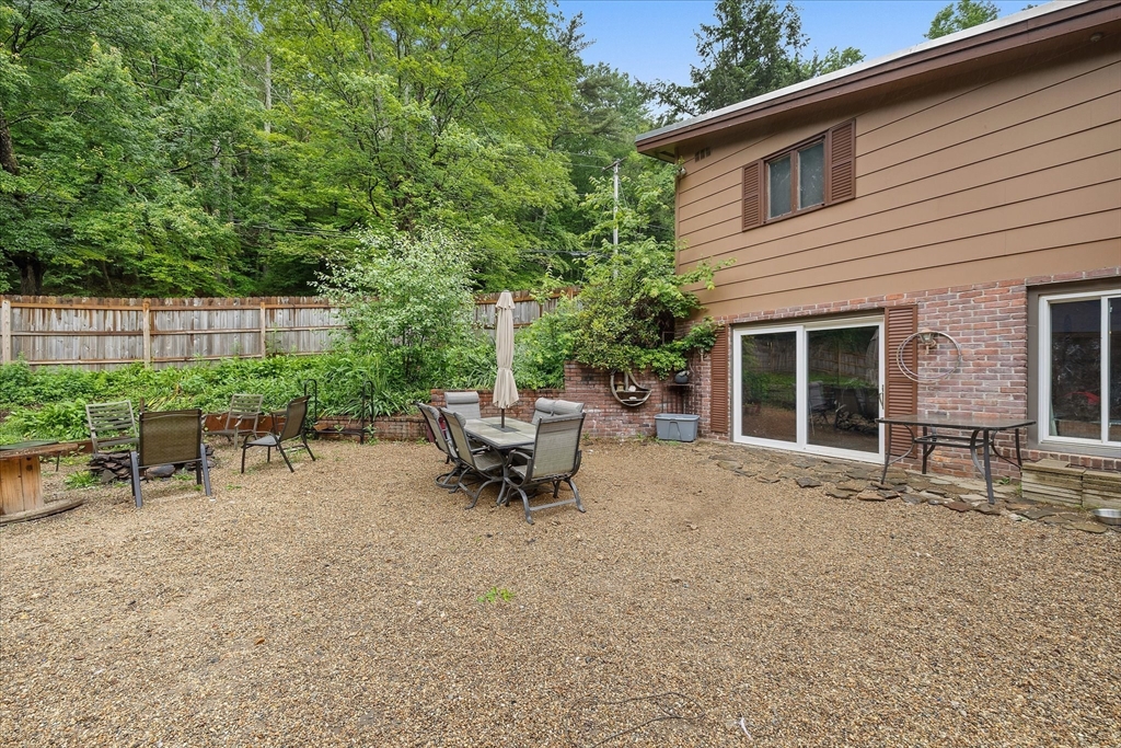 709 North Orange Road Athol, MA 01331 - Photo 35 of 40 a backyard of a house with table and chairs