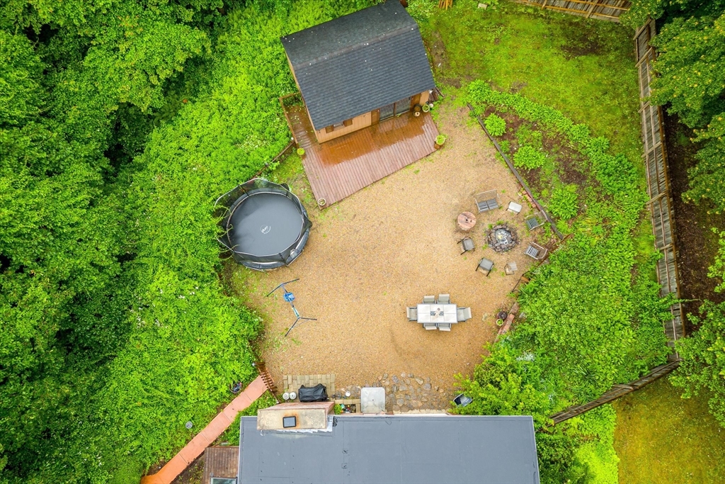 709 North Orange Road Athol, MA 01331 - Photo 38 of 40 an aerial view of a house with a yard and trees all around