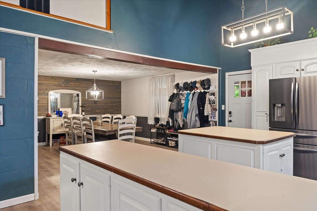 709 North Orange Road Athol, MA 01331 - Photo 10 of 40 a kitchen with stainless steel appliances a sink and refrigerator