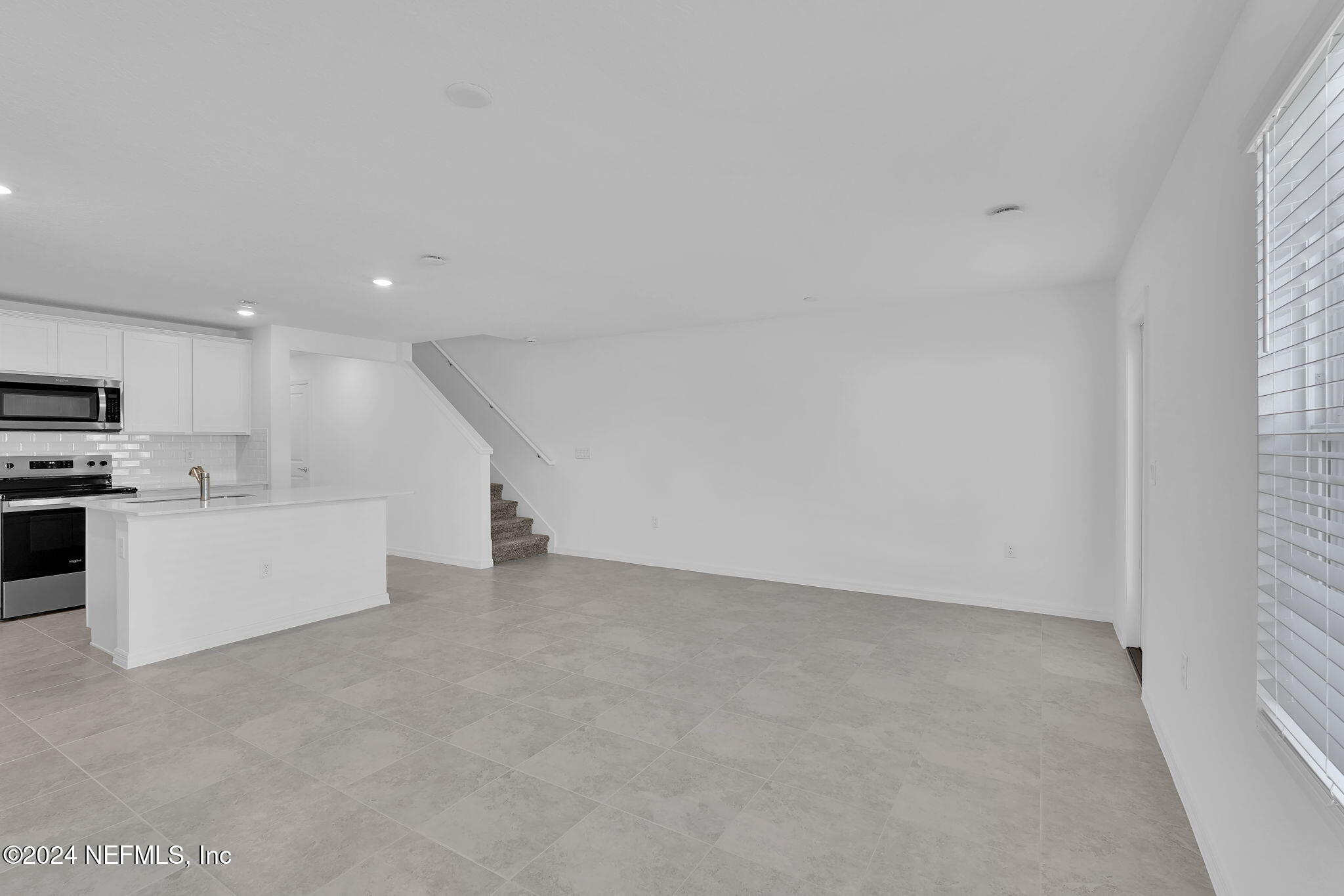 10121 Deep Pine Jacksonville, FL 32221 - Photo 11 of 24 a view of an empty room with kitchen appliances