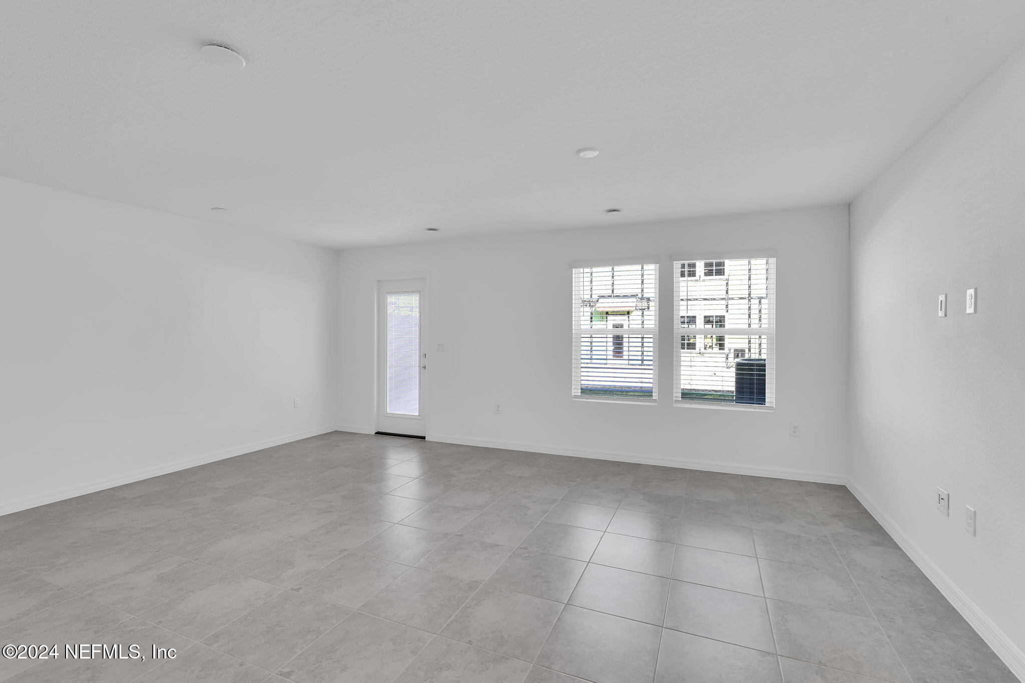10121 Deep Pine Jacksonville, FL 32221 - Photo 12 of 24 an empty room with windows