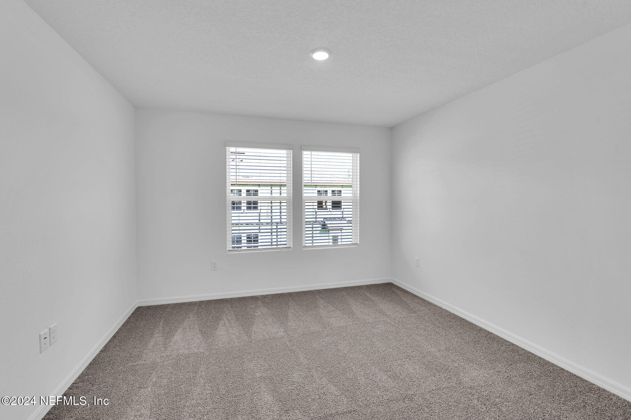 10121 Deep Pine Jacksonville, FL 32221 - Photo 16 of 24 an empty room with a window