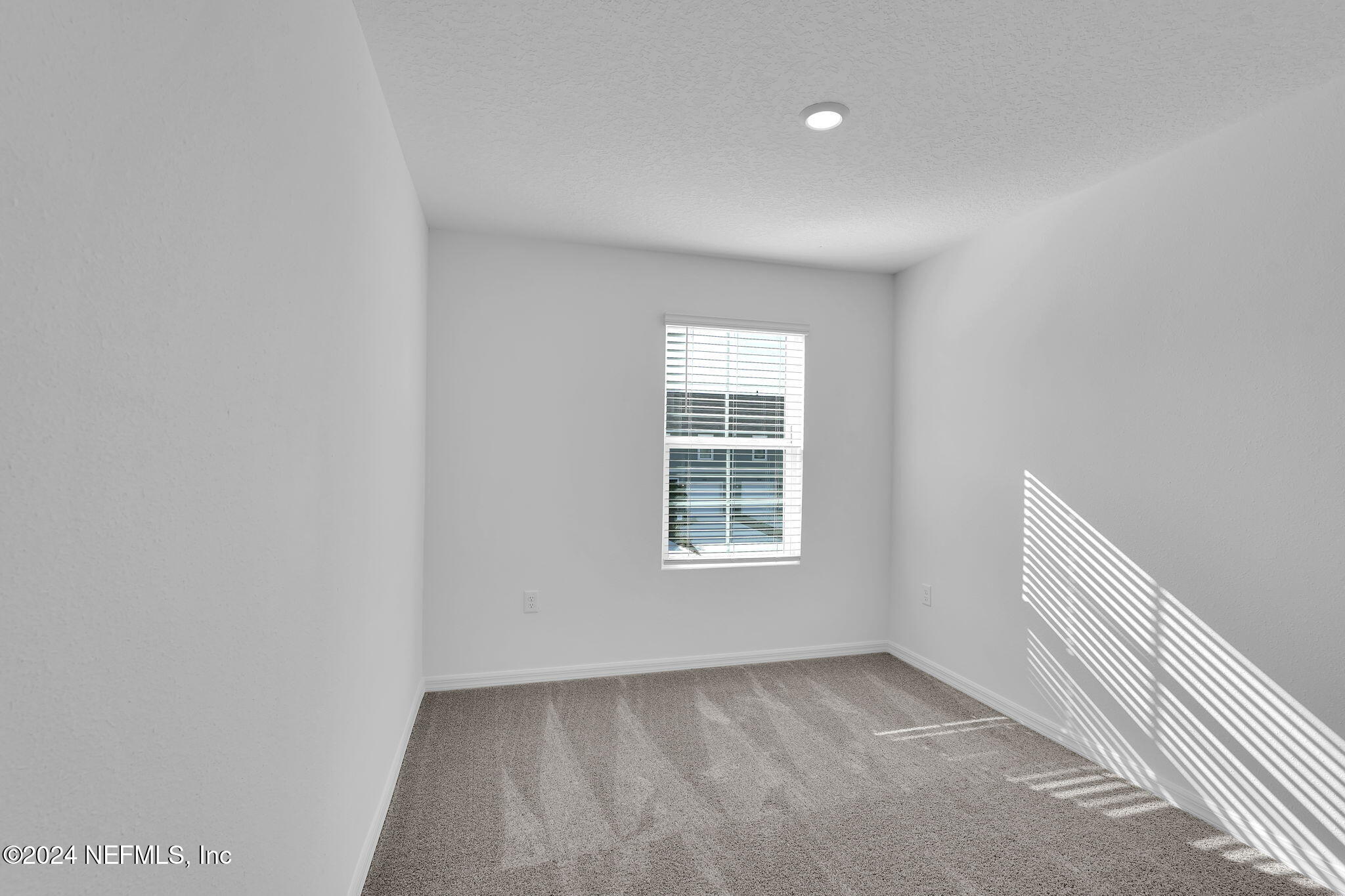 10121 Deep Pine Jacksonville, FL 32221 - Photo 20 of 24 an empty room with a window