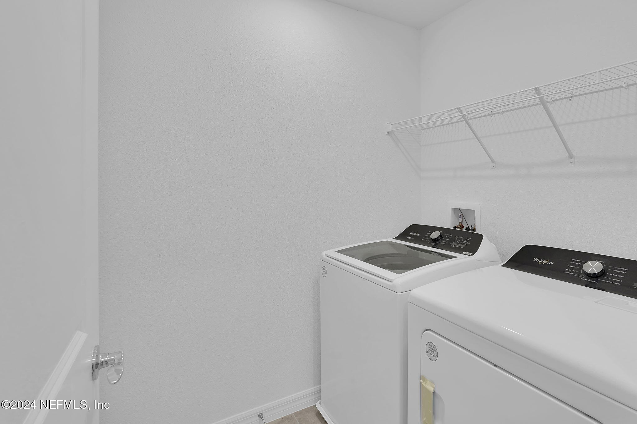 10121 Deep Pine Jacksonville, FL 32221 - Photo 23 of 24 a utility room with dryer and washer
