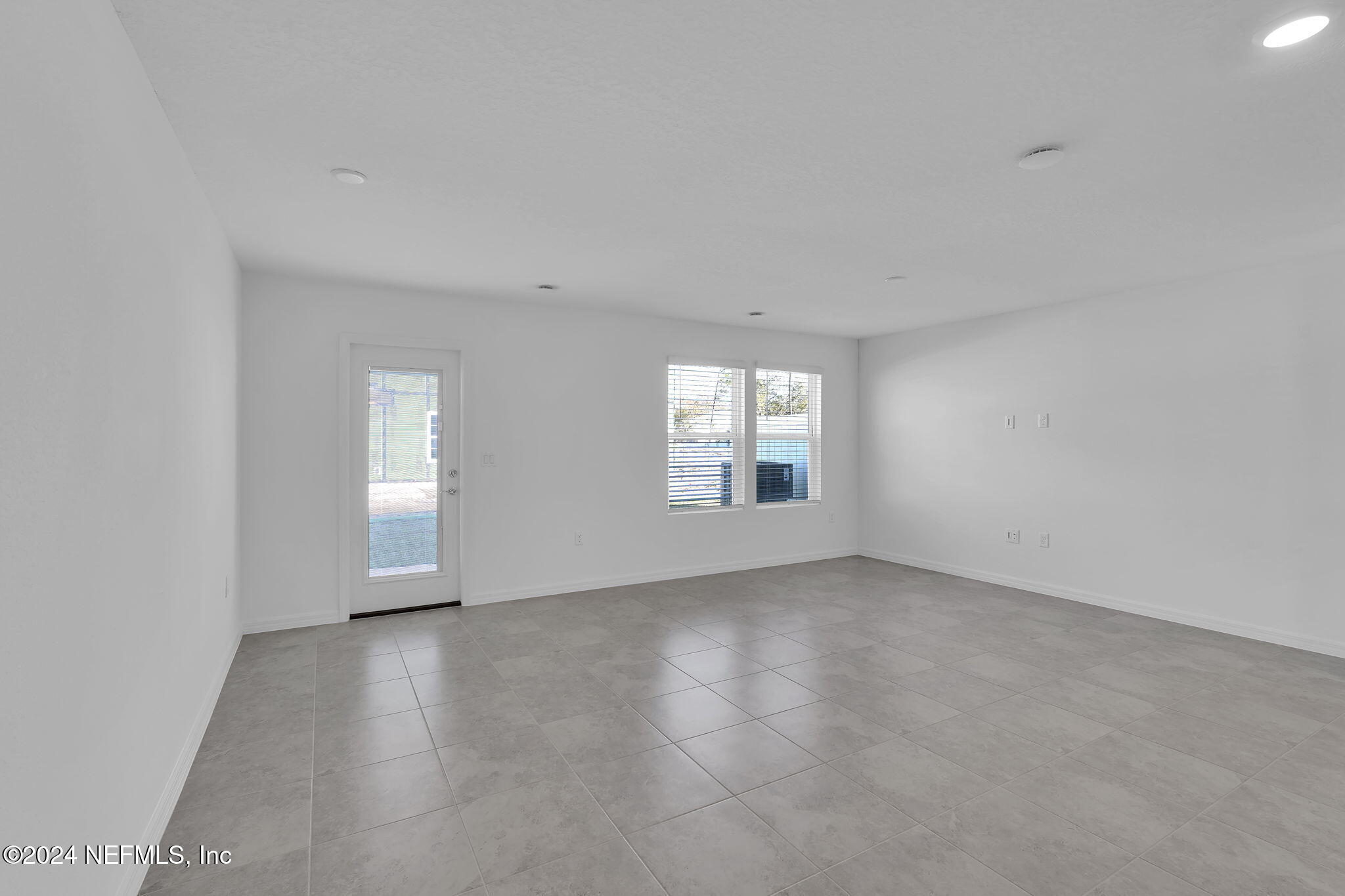10121 Deep Pine Jacksonville, FL 32221 - Photo 9 of 24 an empty room with windows