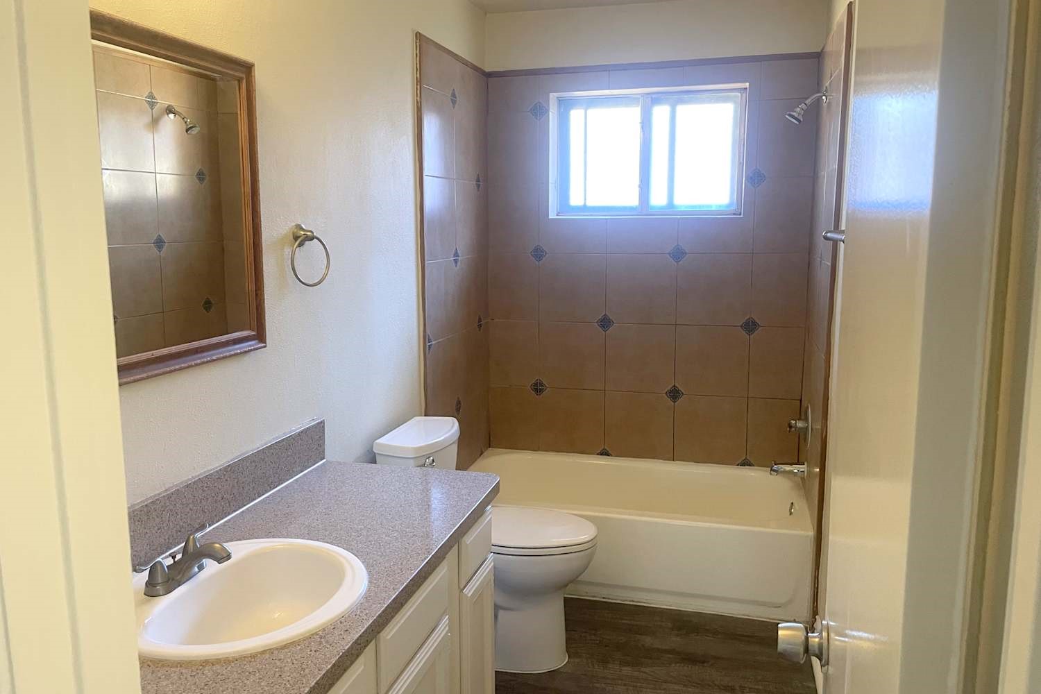 1819 Pilgrims Point Drive Friendswood, TX 77546 - Photo 8 of 10 a bathroom with a sink a toilet and shower