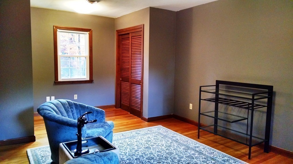 151 Hudson Road Stow, MA 01775 - Photo 13 of 17 a living room with furniture and a window