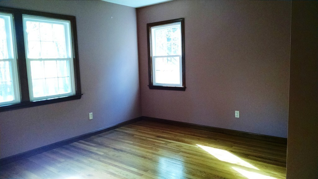 151 Hudson Road Stow, MA 01775 - Photo 14 of 17 a view of empty room with window