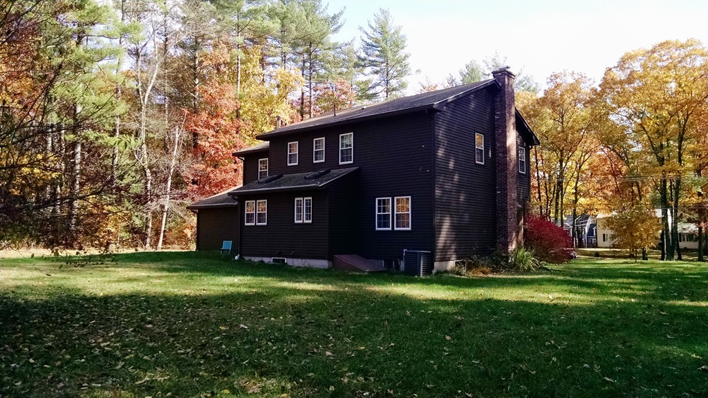 151 Hudson Road Stow, MA 01775 - Photo 15 of 17 a view of a back yard