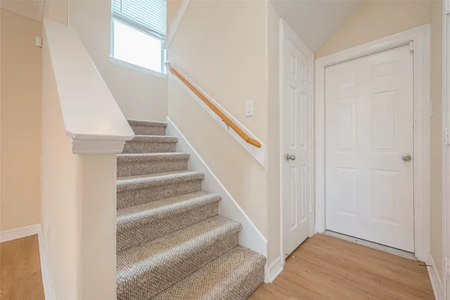 a view of staircase with white walls and white walls
